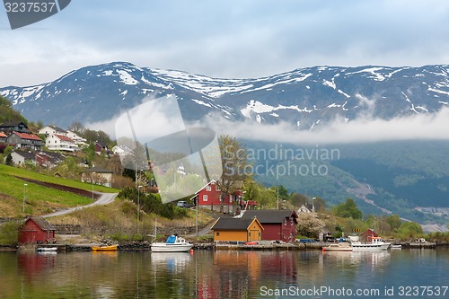 Image of Landscape with mountains.  village in Norwegian fjords