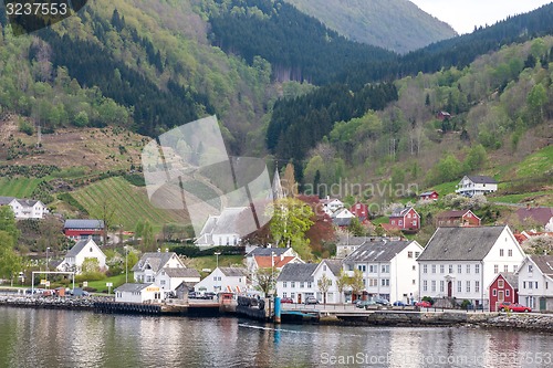 Image of Landscape with mountains.  village in Norwegian fjords