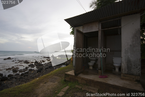 Image of OUTHOUSE TOILETS BY SEA