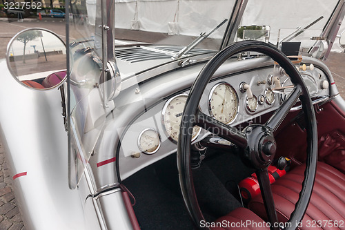 Image of SIRMIONE, Province of Brescia,  ITALY - MAY 08 unidentified crew on an old car BMW 328 coupe 1938 in italian historical rally Mille Miglia 2014, on May 08, 2014 in  Lake Garda town of Sirmione, Italy