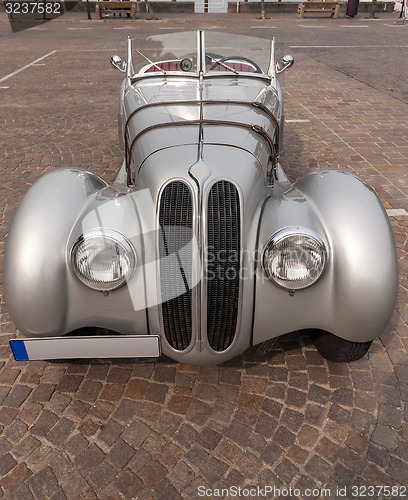 Image of SIRMIONE, Province of Brescia,  ITALY - MAY 08 unidentified crew on an old car BMW 328 coupe 1938 in italian historical rally Mille Miglia 2014, on May 08, 2014 in  Lake Garda town of Sirmione, Italy