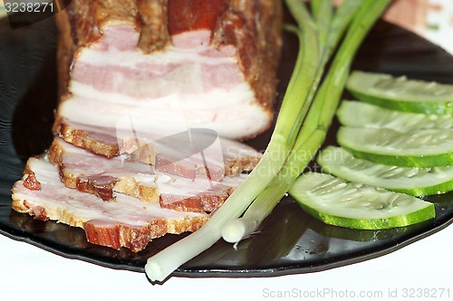 Image of meat with spring onions