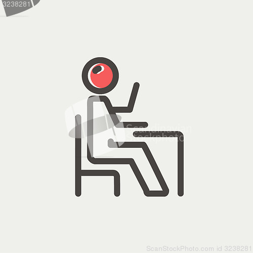 Image of Student sitting on a chair in front of his table thin line icon