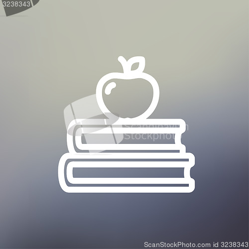 Image of Three books with apple on the top thin line icon