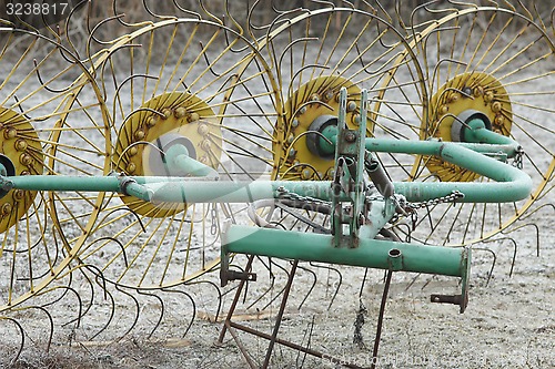 Image of unit for raking hay from metal