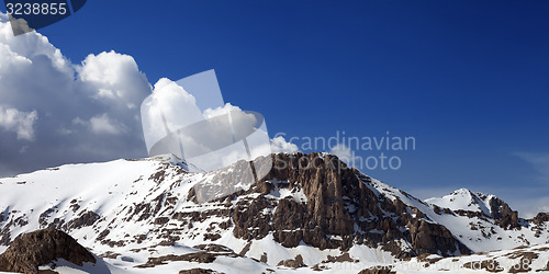 Image of Panoramic view of snowy rocks in nice day