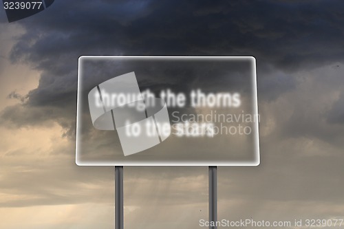 Image of Billboard with inscription through thorns to stars