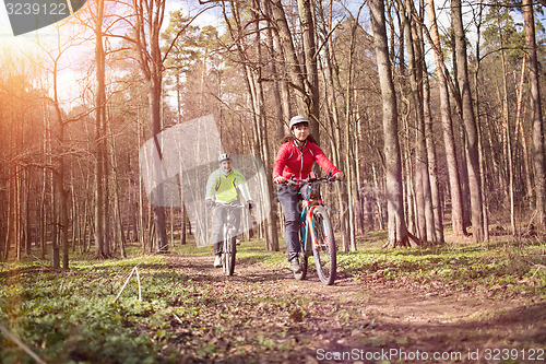 Image of Young people riding bikes