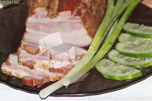 Image of fresh cooked meat with spring onions