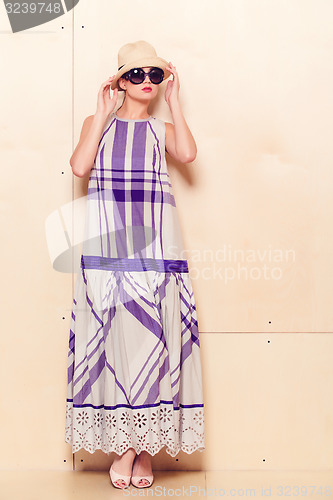 Image of Full-length portrait of a lovely woman in romantic dress