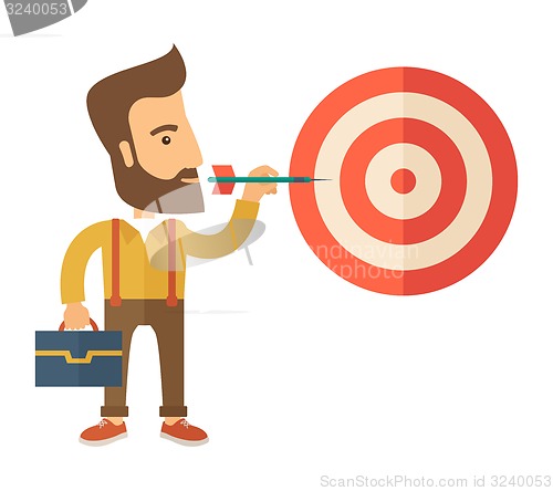 Image of Working man holding a target arrow 