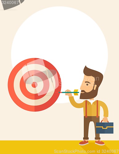 Image of Working man holding a target arrow 