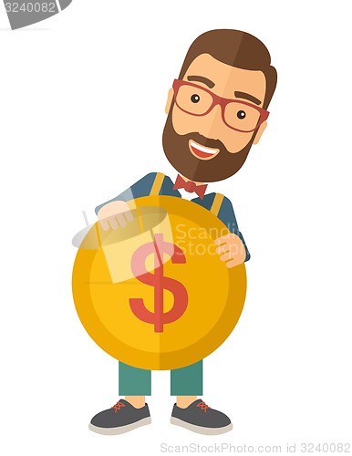 Image of Businessman holding a big coin