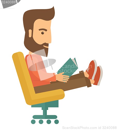 Image of Man sitting with a book
