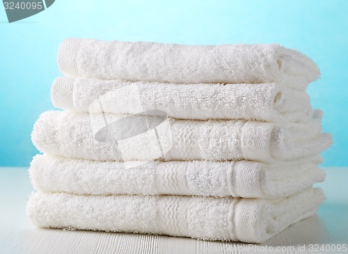 Image of stack of white spa towels