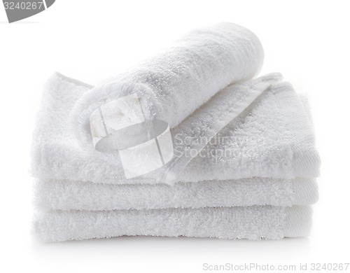 Image of stack of white spa towels