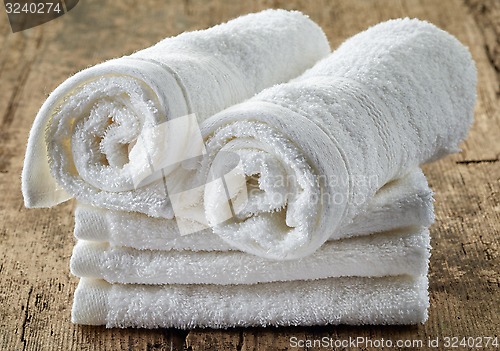 Image of stack of white spa towels