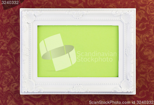 Image of White Frame on dark red 