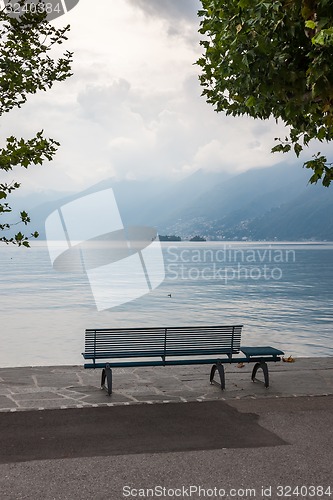 Image of lonely bench overlooking the lake Maggiore