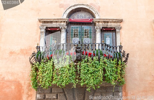 Image of typical decorative balcony in the old town 