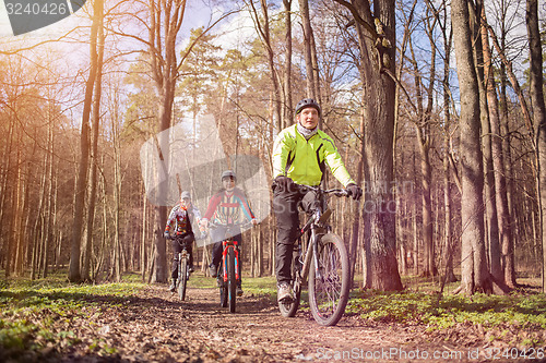 Image of Young people riding bikes