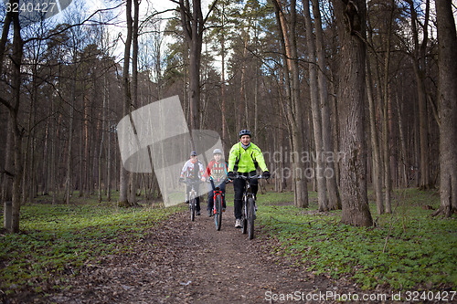 Image of Young people riding bikes