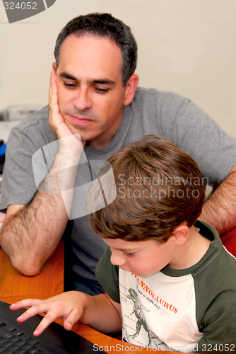 Image of Father son computer