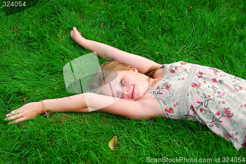 Image of Young girl grass