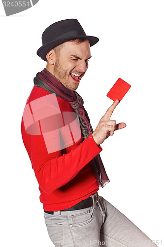 Image of Smiling casual man showing blank credit card