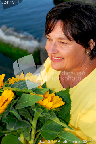 Image of Mature woman flowers