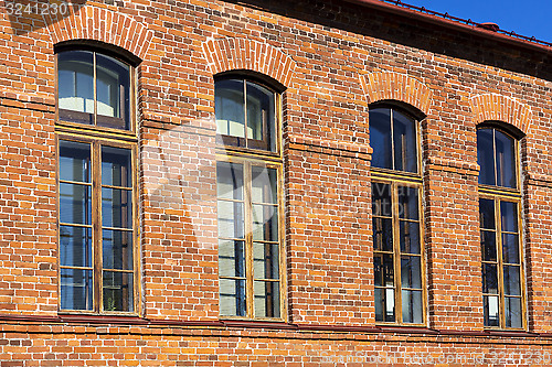 Image of Red brick retro house with windows