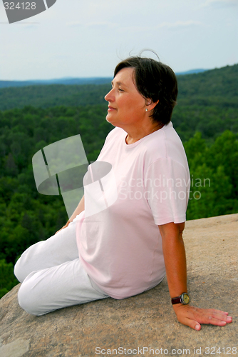 Image of Woman edge cliff