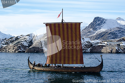 Image of Copy of a Viking ship entering the port of Svolvaer