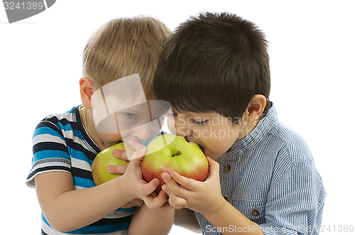Image of Two Boys Eating Apples