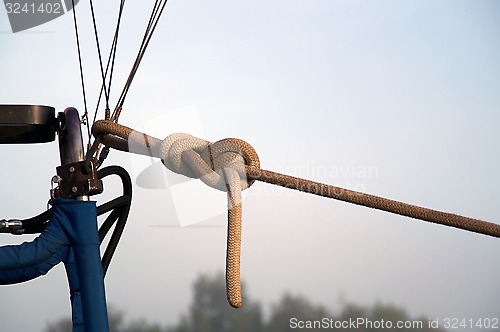 Image of strong rope tied to cables of hot air balloon