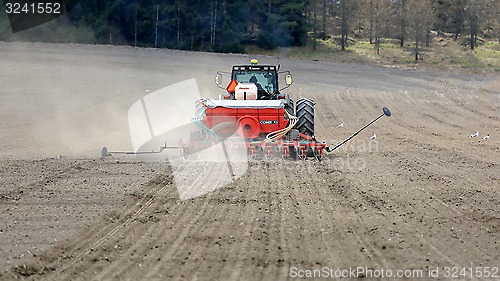 Image of Valmet 8550 Tractor and Seeder on Field at Spring