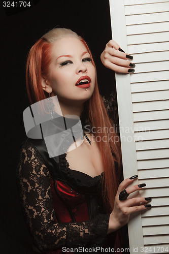 Image of Gothic girl with white board