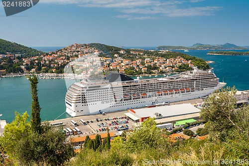 Image of Dubrovnik, Croatia - September 11, 2009: The big Cruising ship of the MSC Cruises in Croatian town Dubrovnik