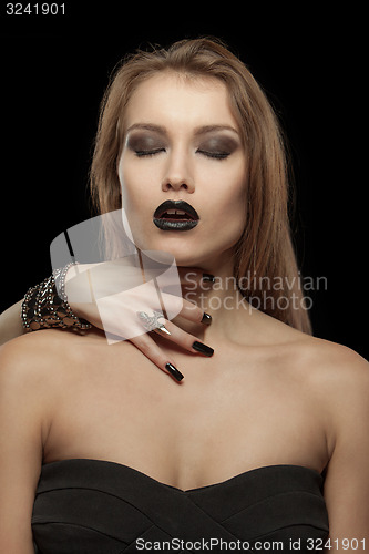 Image of Gothic woman with hand of vampire on her neck