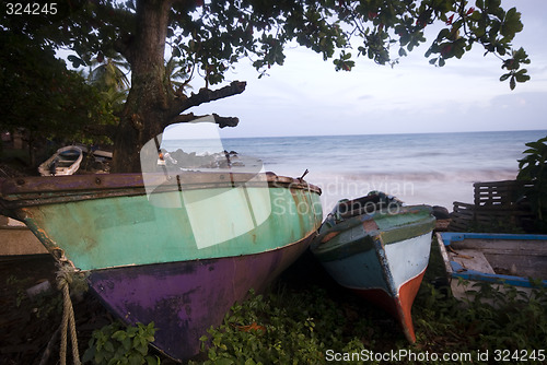 Image of old boats by the sea