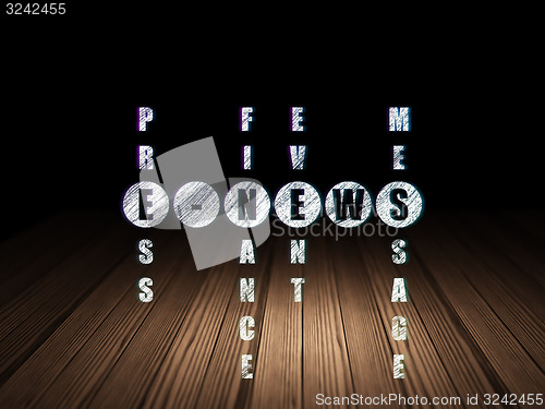 Image of News concept: word E-news in solving Crossword Puzzle