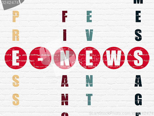 Image of News concept: word E-news in solving Crossword Puzzle