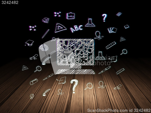 Image of Education concept: Computer Pc in grunge dark room