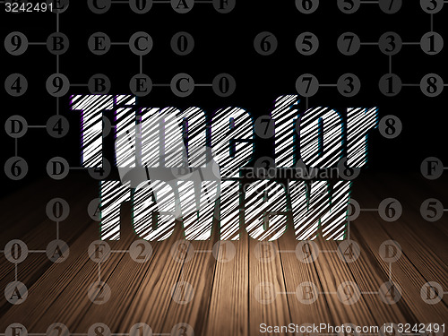 Image of Time concept: Time for Review in grunge dark room
