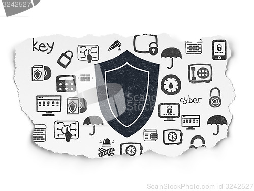 Image of Safety concept: Shield on Torn Paper background