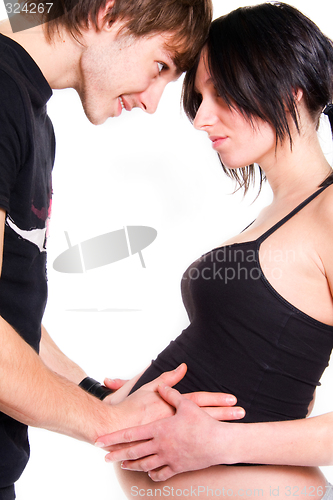 Image of young couple expecting a baby