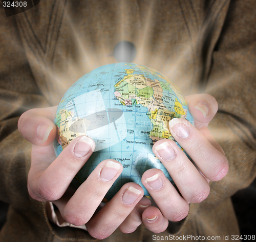 Image of Globe in a girl's hands