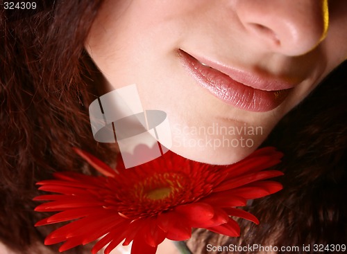 Image of Girl with a red flower