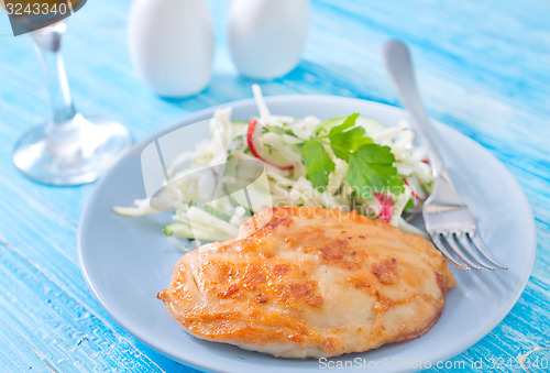 Image of chicken breast with salad
