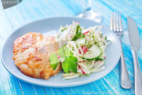 Image of chicken breast with salad